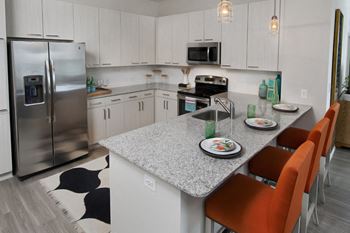 Luxury Kitchen with Light Cabinetry at Apartment Homes Near Suntrust Park